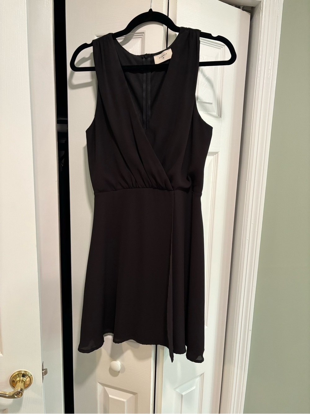 Everly Sleeveless Black Wrap Skater Dress